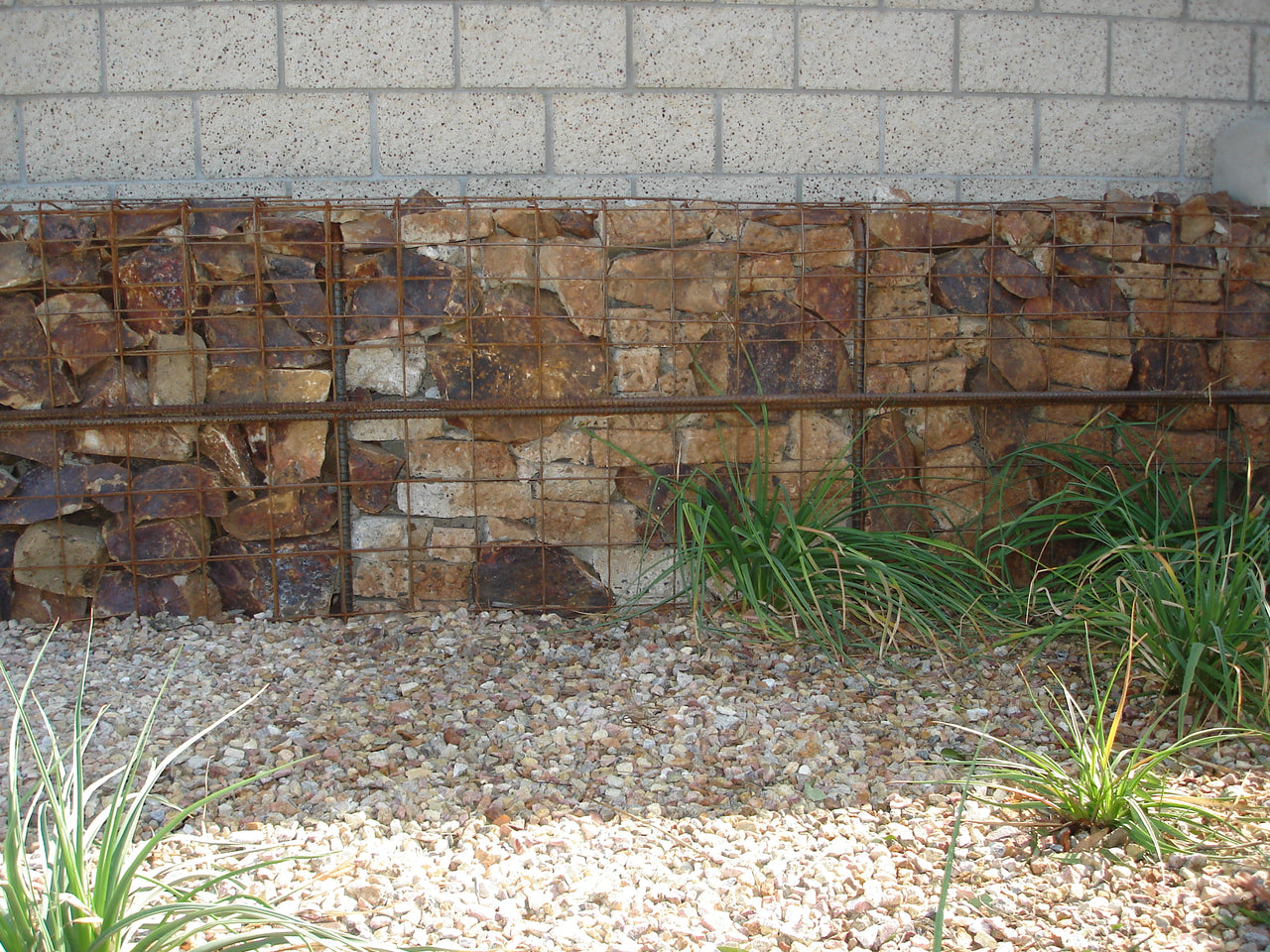 Gabion Stone Wall along with decorative stones with plants