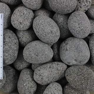 Black Lava Pebble Sample Photo that shows the grain of the stone