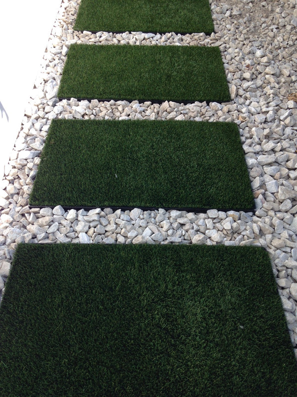 White gravel in a pathway application with artificial grass